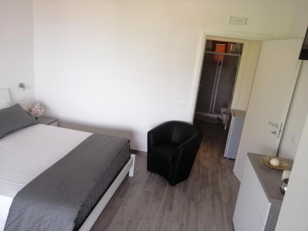 Postel nebo postele na pokoji v ubytování Cala Petrosa Resort