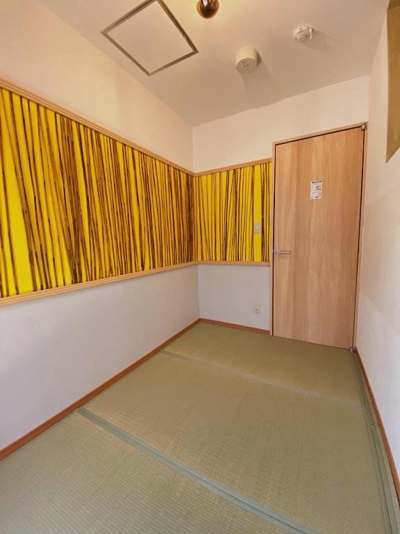 Lucy's House横浜中華街 House5にあるベッド