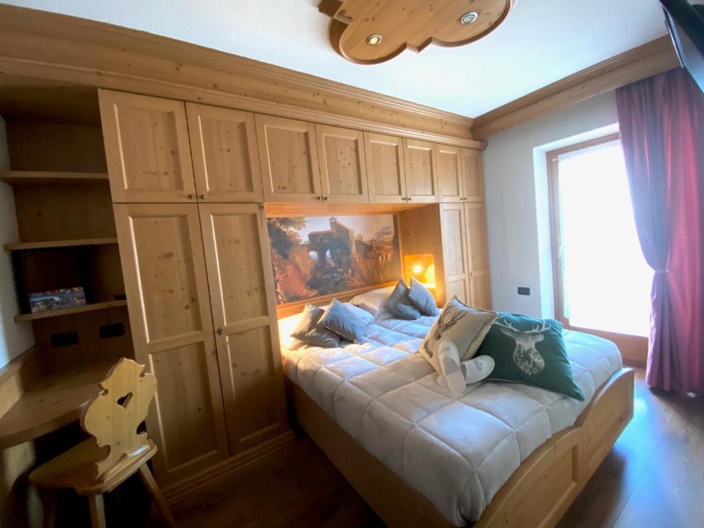 Postel nebo postele na pokoji v ubytování Hotel Laurino