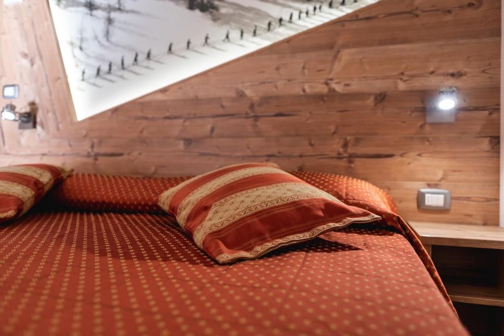 Postel nebo postele na pokoji v ubytování Hotel Touring