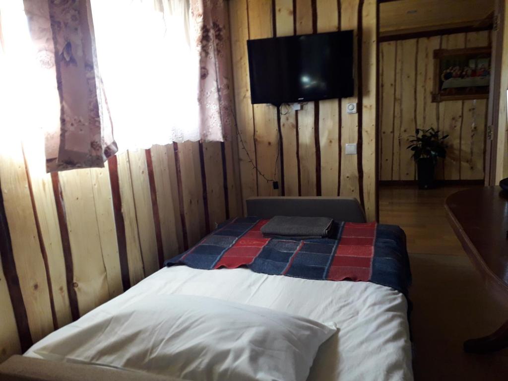 Postel nebo postele na pokoji v ubytování Pid Goroyu