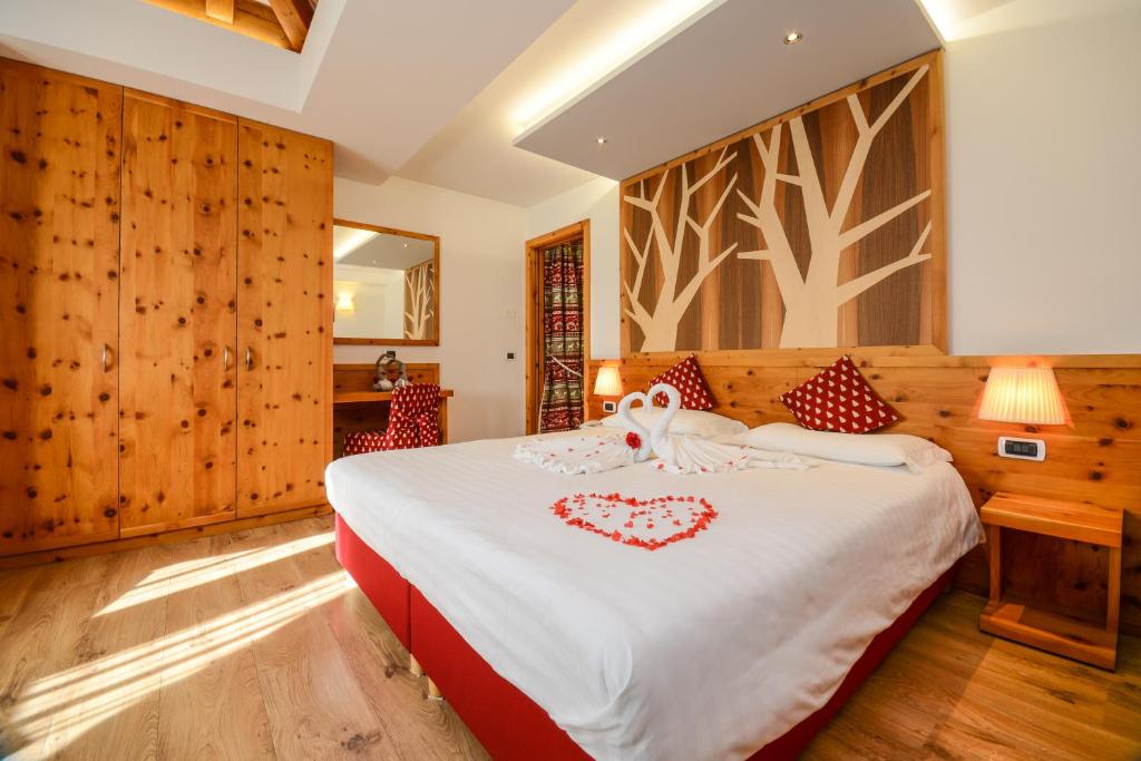 Postel nebo postele na pokoji v ubytování Hotel Corona