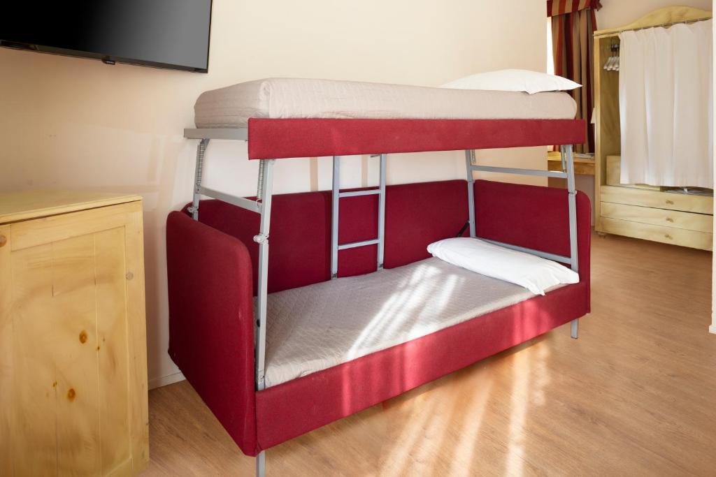 Postel nebo postele na pokoji v ubytování Hotel LaMorosa