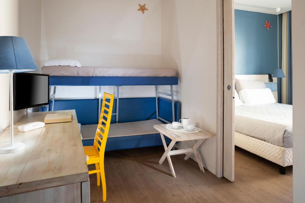 Postel nebo postele na pokoji v ubytování Hotel LaMorosa