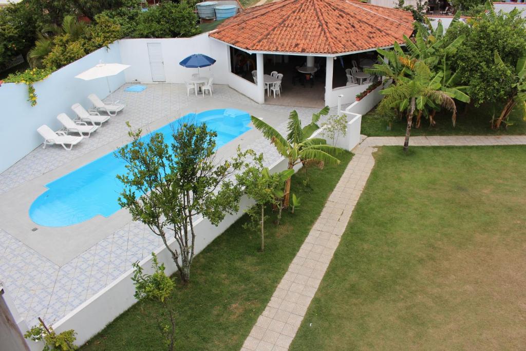  Apartamento com piscina perto da praia
