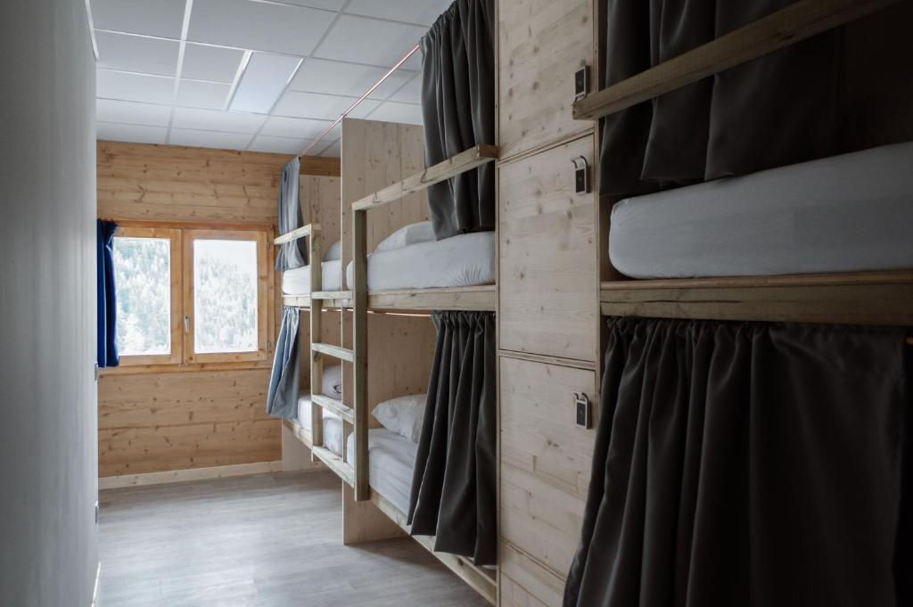 Postel nebo postele na pokoji v ubytování BodyGo Hostel
