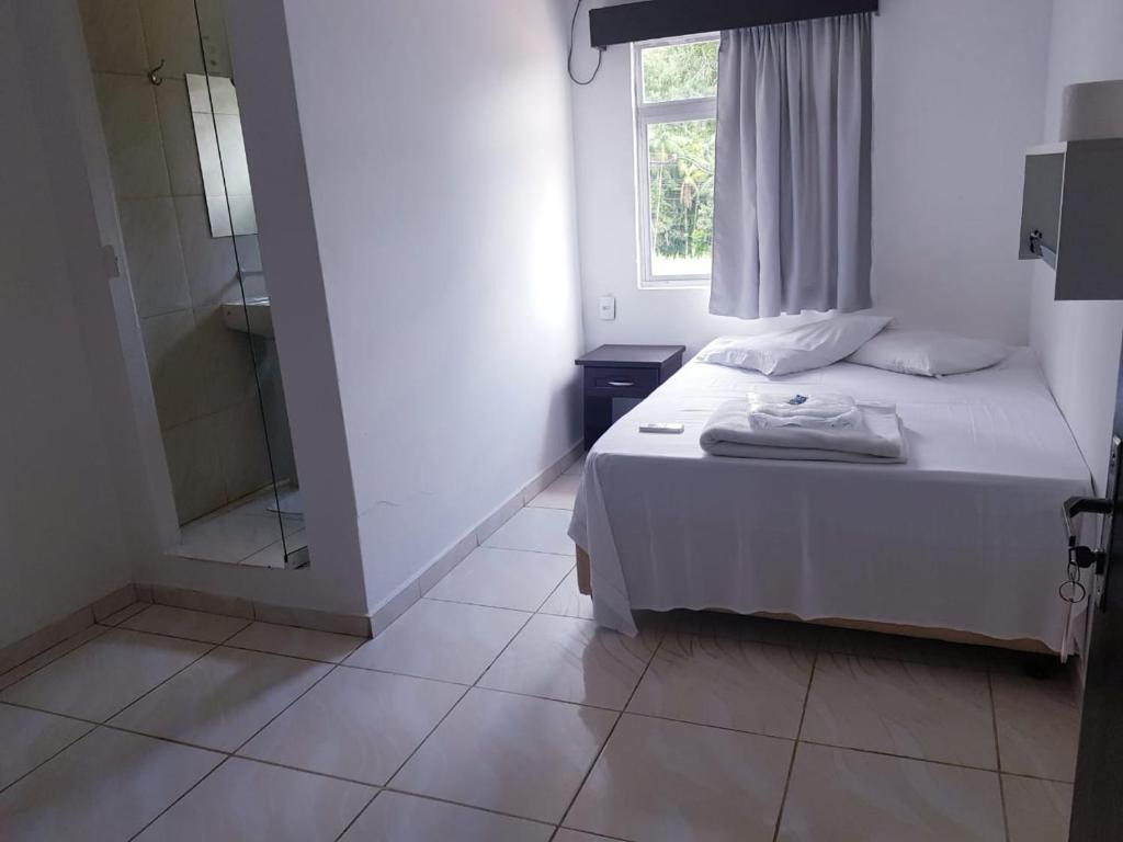 Giường trong phòng chung tại Hotel Salto do Norte