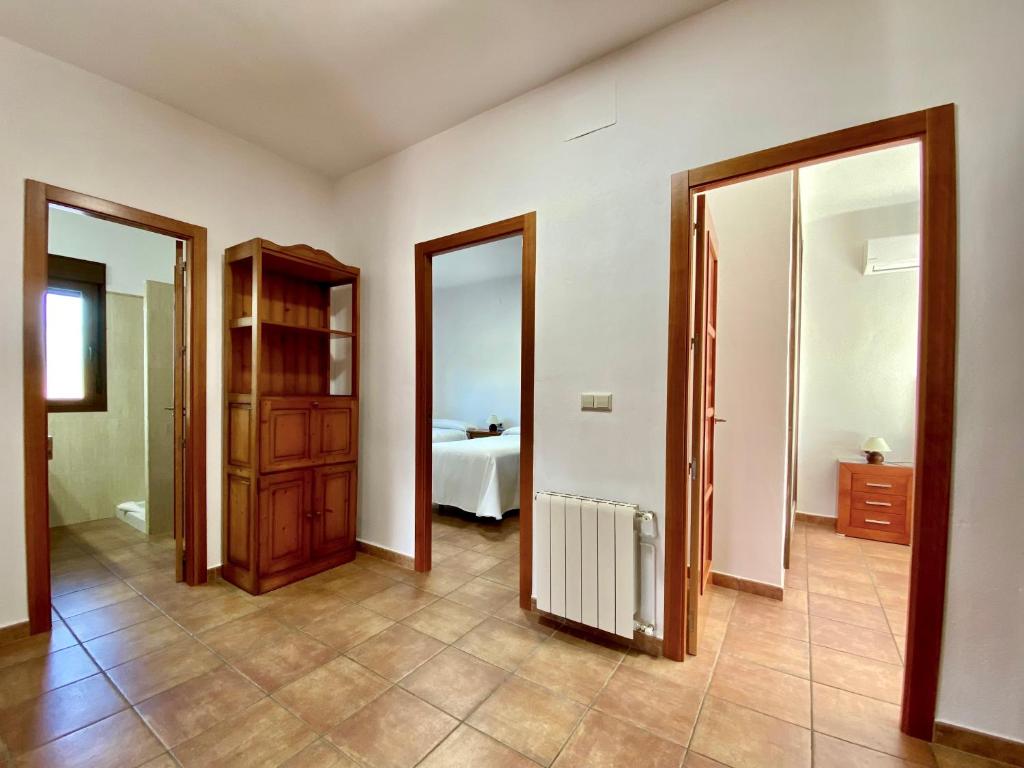 Postel nebo postele na pokoji v ubytování Apartamentos Cedro Alto