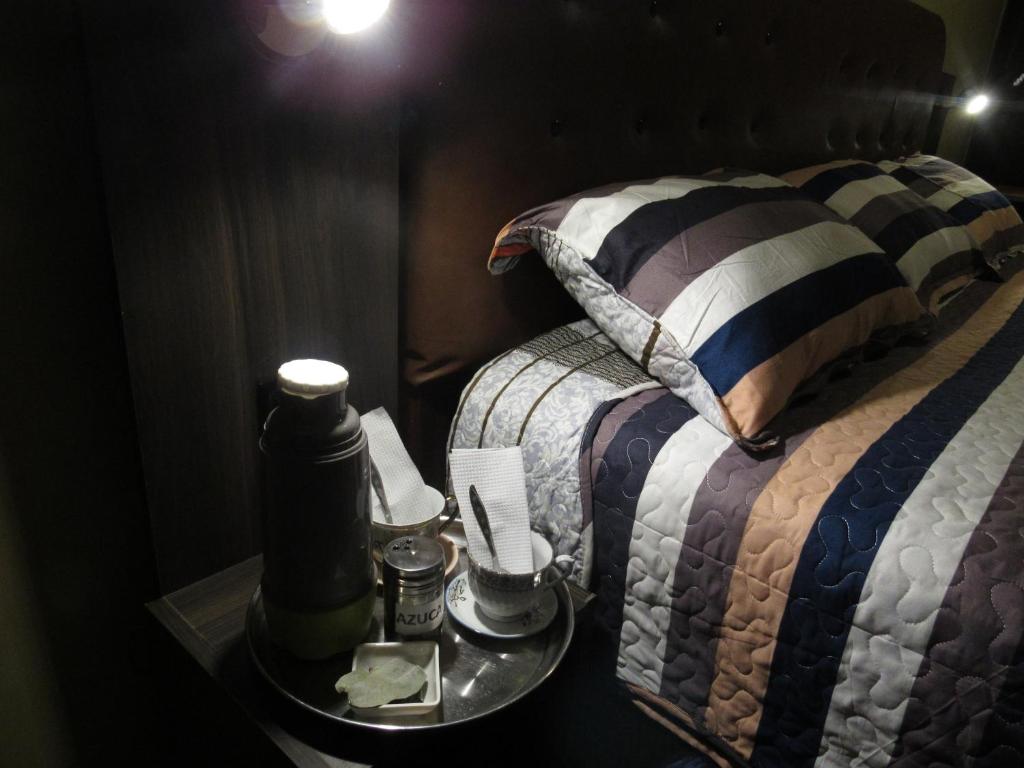 Postel nebo postele na pokoji v ubytování Hotel Sueños Dorados