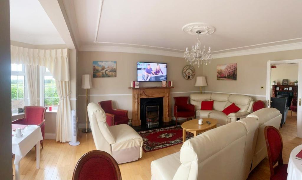 TV a/nebo společenská místnost v ubytování Rockfield Manor B&B, Knock