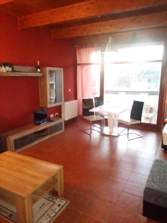 Posezení v ubytování Apartmán v arealu Doky Lipno