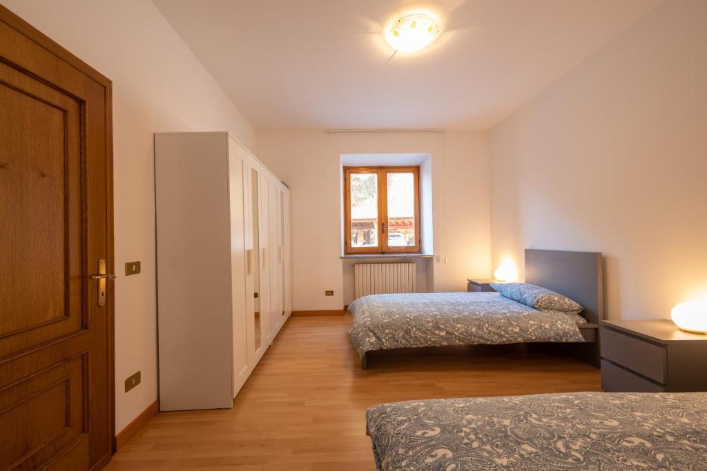 Postel nebo postele na pokoji v ubytování SEVEN ALDO FLAT