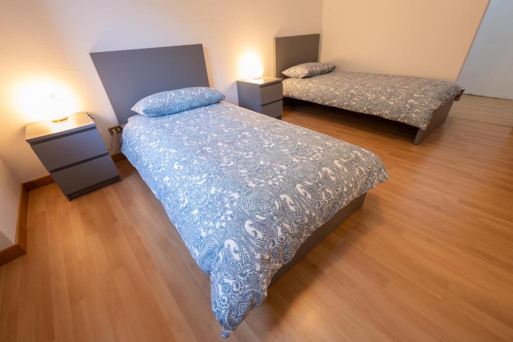Postel nebo postele na pokoji v ubytování SEVEN ALDO FLAT