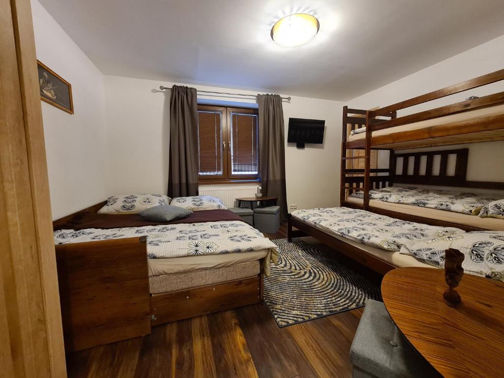 Posteľ alebo postele v izbe v ubytovaní Villa Korálka