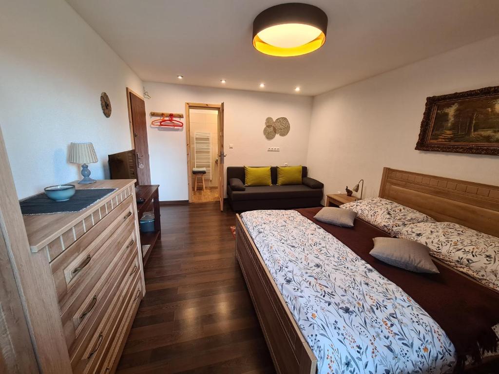 Posteľ alebo postele v izbe v ubytovaní Villa Korálka