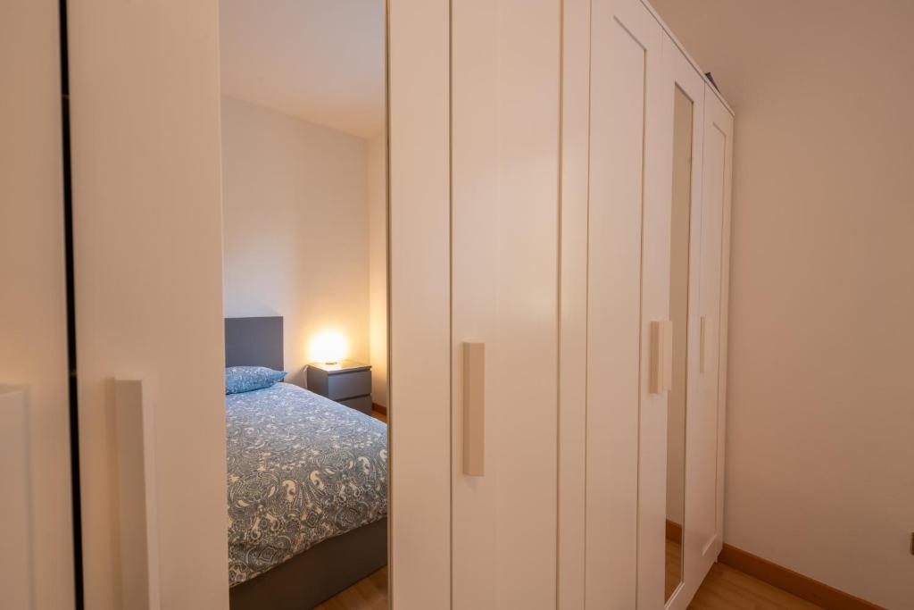 Postel nebo postele na pokoji v ubytování SEVEN ALDO FLAT