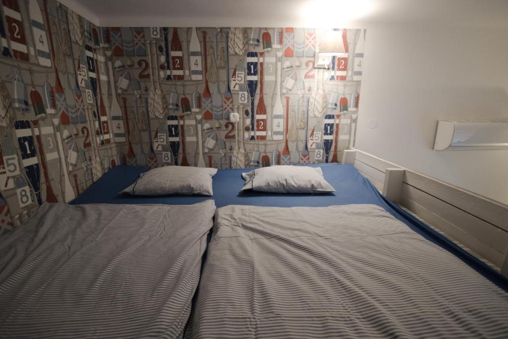 Postel nebo postele na pokoji v ubytování Ister Guesthouse