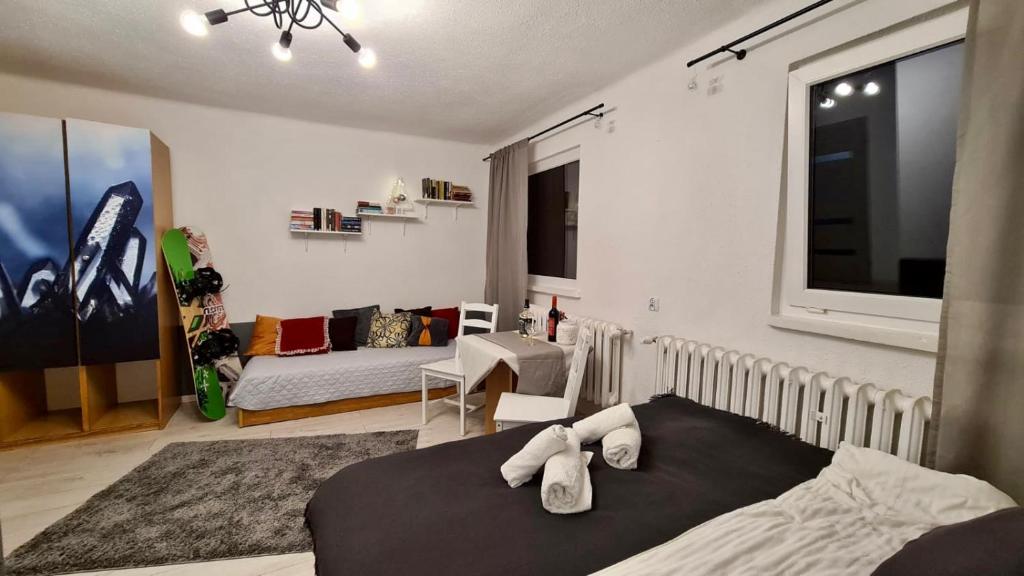Postel nebo postele na pokoji v ubytování 3 Kroki Do Lasu