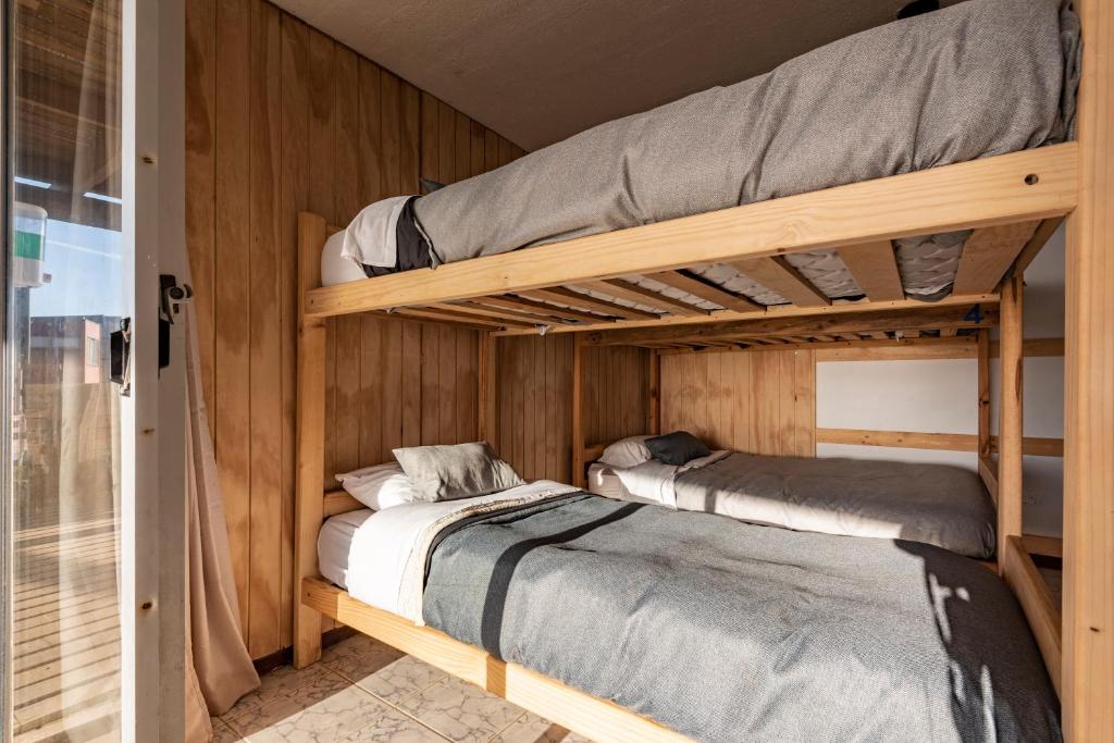 Letto o letti in una camera di Sudeste Hostel