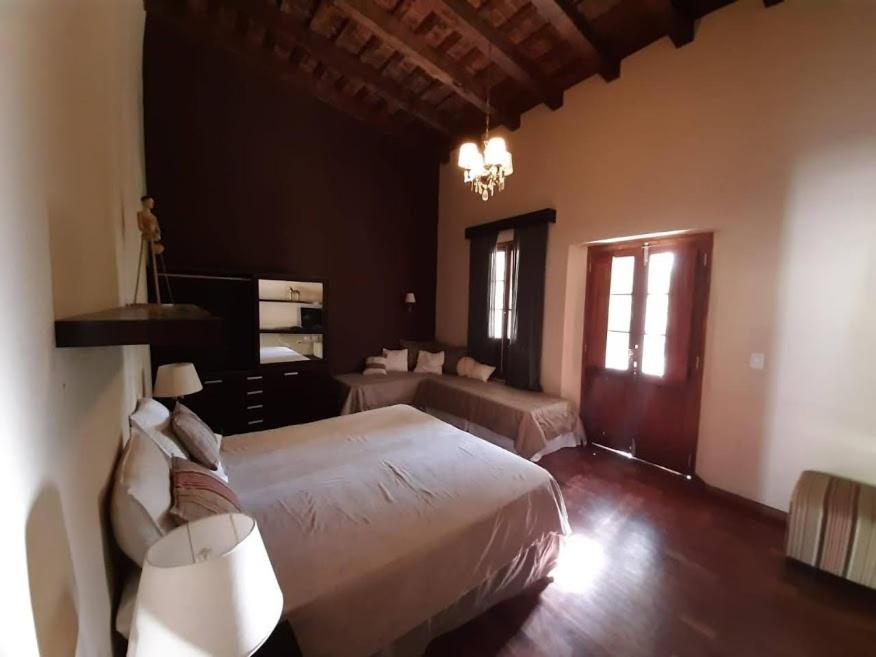 Cama o camas de una habitación en Estancia La Hungria