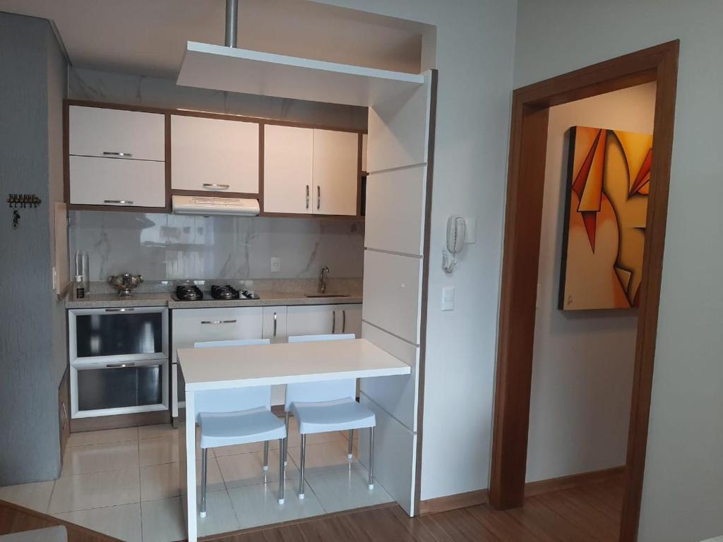 APARTAMENTO A UMA QUADRA DO HARD ROCK CAFÉ GRAMADO  APARTAMENTO A UMA QUADRA DO HARD ROCK CAFÉ GRAMADO