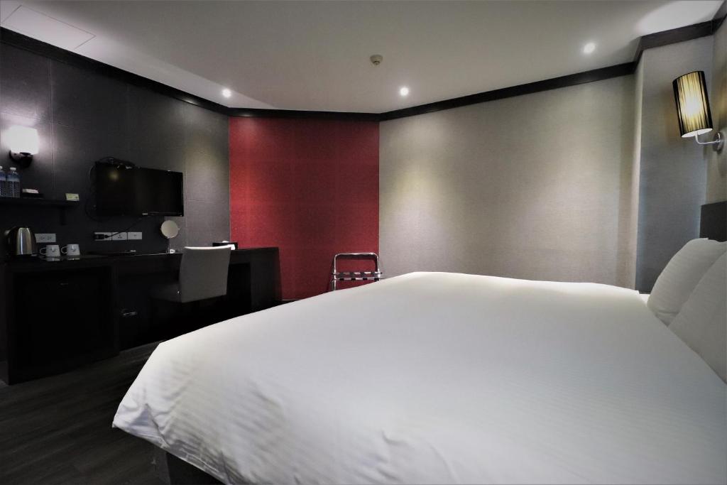 Postel nebo postele na pokoji v ubytování J-HOTEL