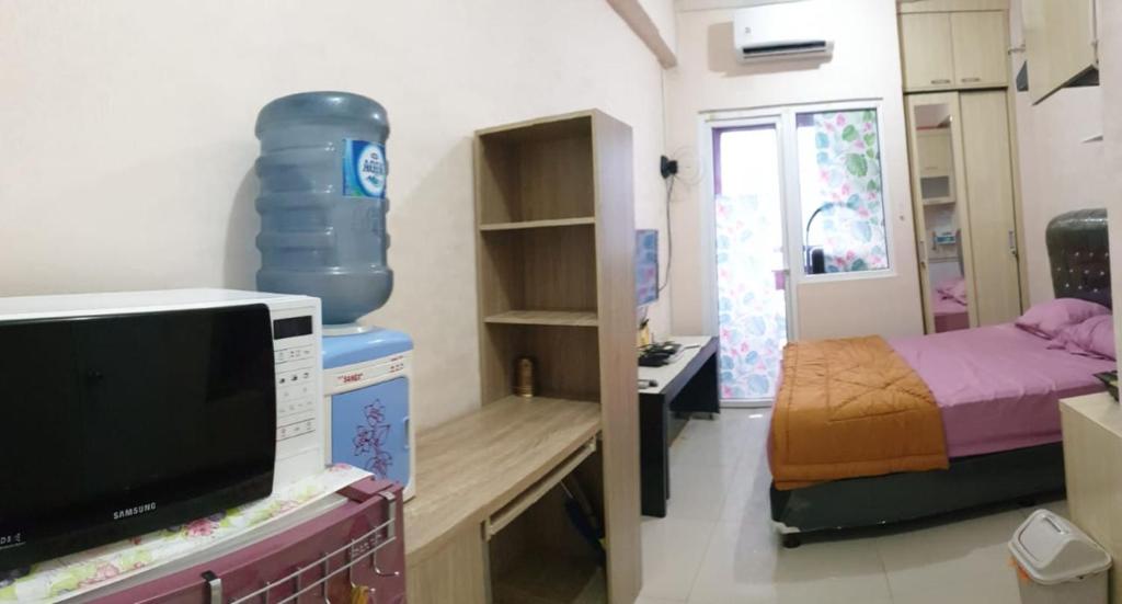 Kayla Rooms Green Pramuka
