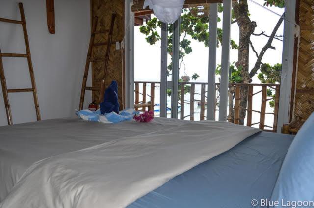 Postel nebo postele na pokoji v ubytování Blue Lagoon Dive Resort