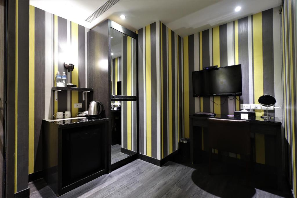 TV a/nebo společenská místnost v ubytování J-HOTEL
