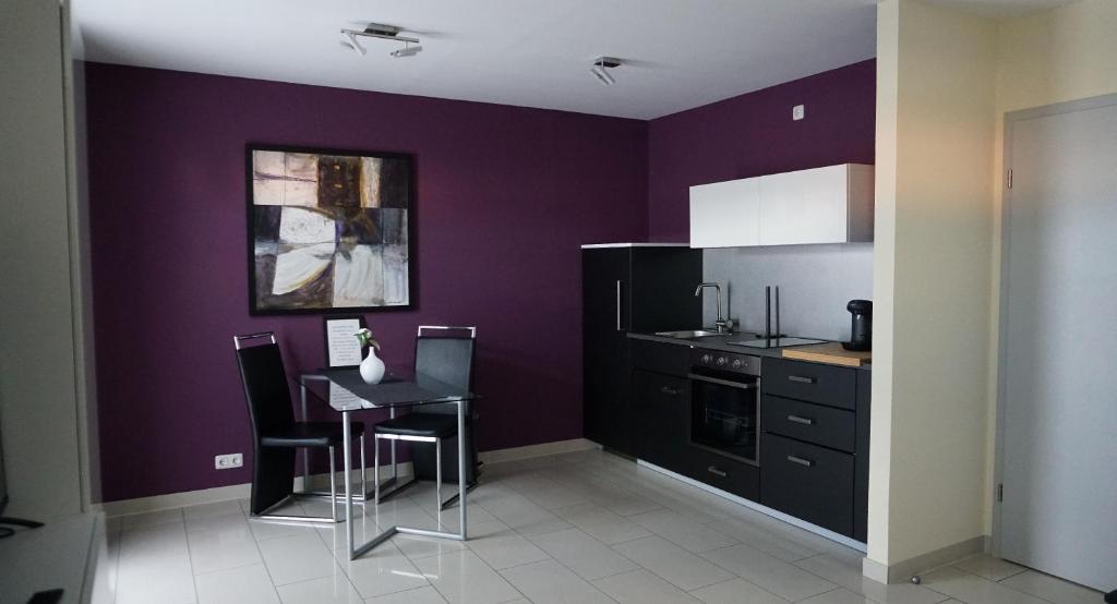 Kuchyň nebo kuchyňský kout v ubytování Hotel Come In