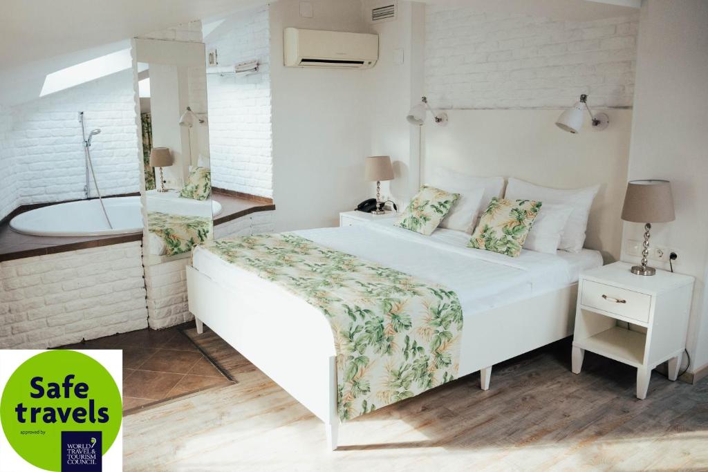 Кровать или кровати в номере Отель Ломоносов