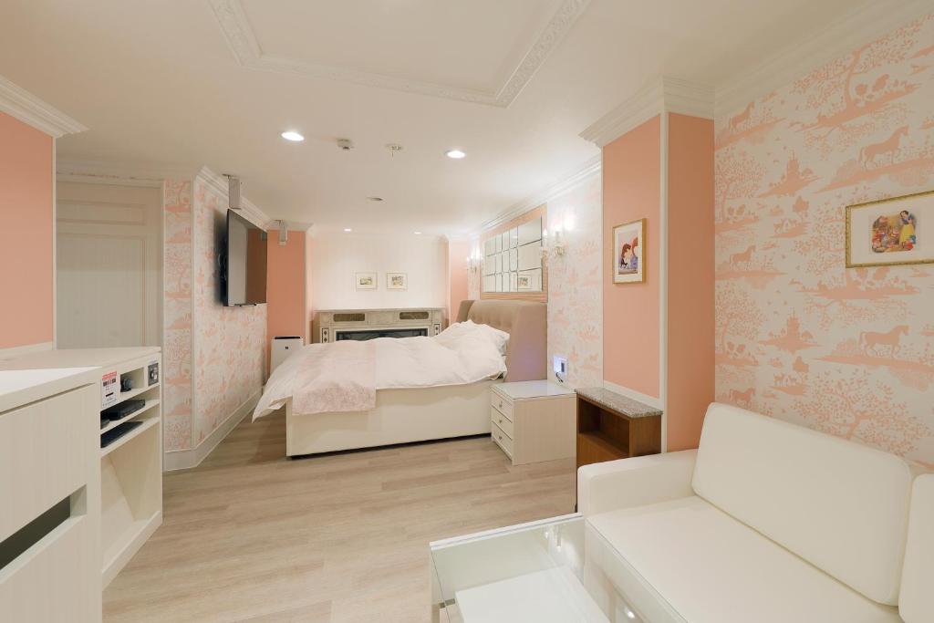 Postel nebo postele na pokoji v ubytování ホテルバースデーきよす店 HOTEL Birthday kiyosu