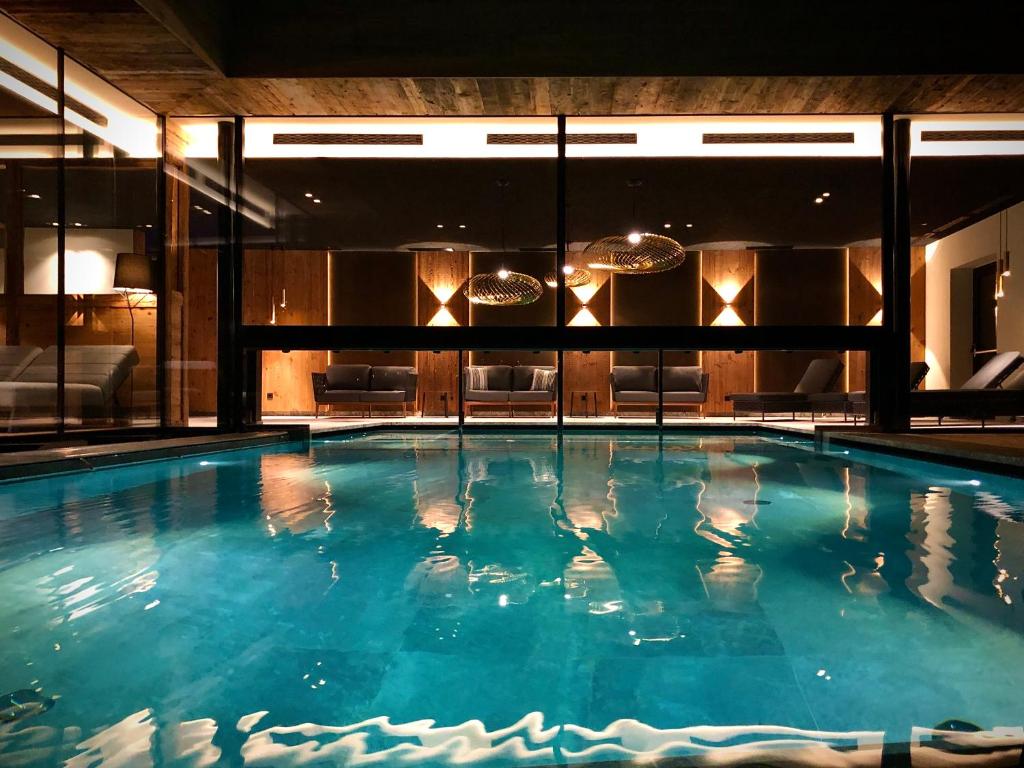 Bazén v ubytování Hotel Niblea Dolomites nebo v jeho okolí