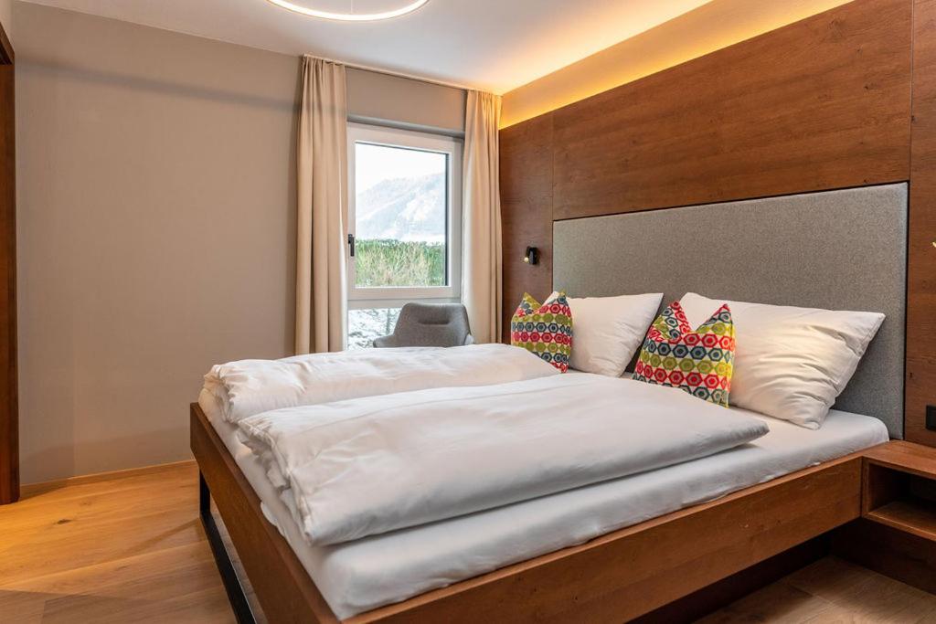 Posteľ alebo postele v izbe v ubytovaní Appartements Wehrhof by Schladmingurlaub