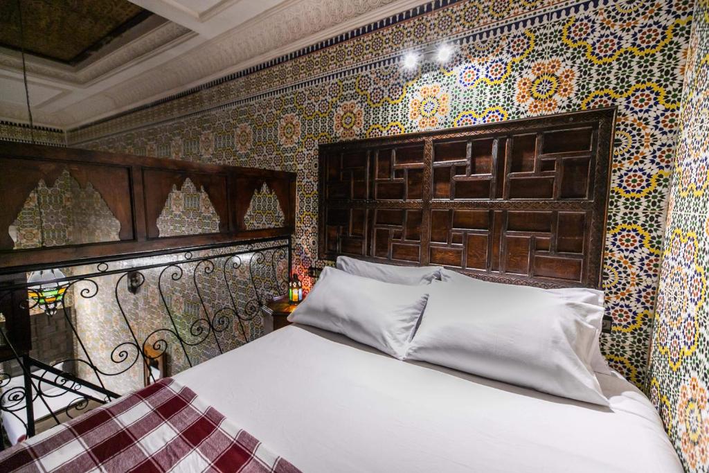 Postel nebo postele na pokoji v ubytování Riad Fes Aicha