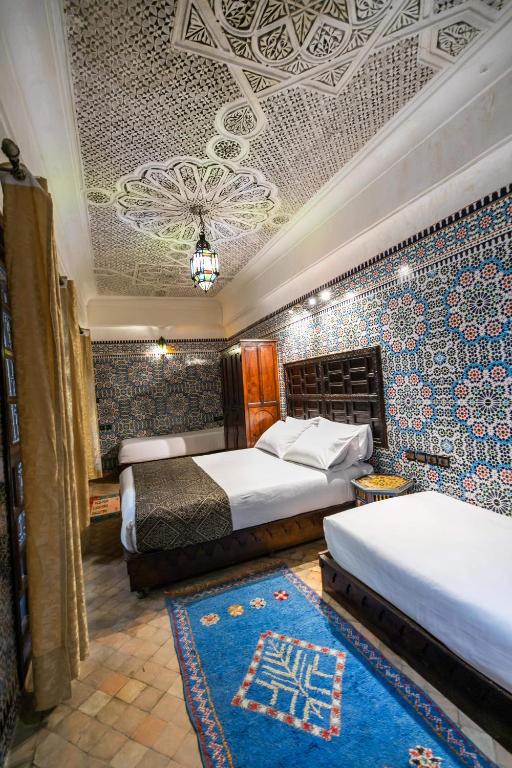 Postel nebo postele na pokoji v ubytování Riad Fes Aicha