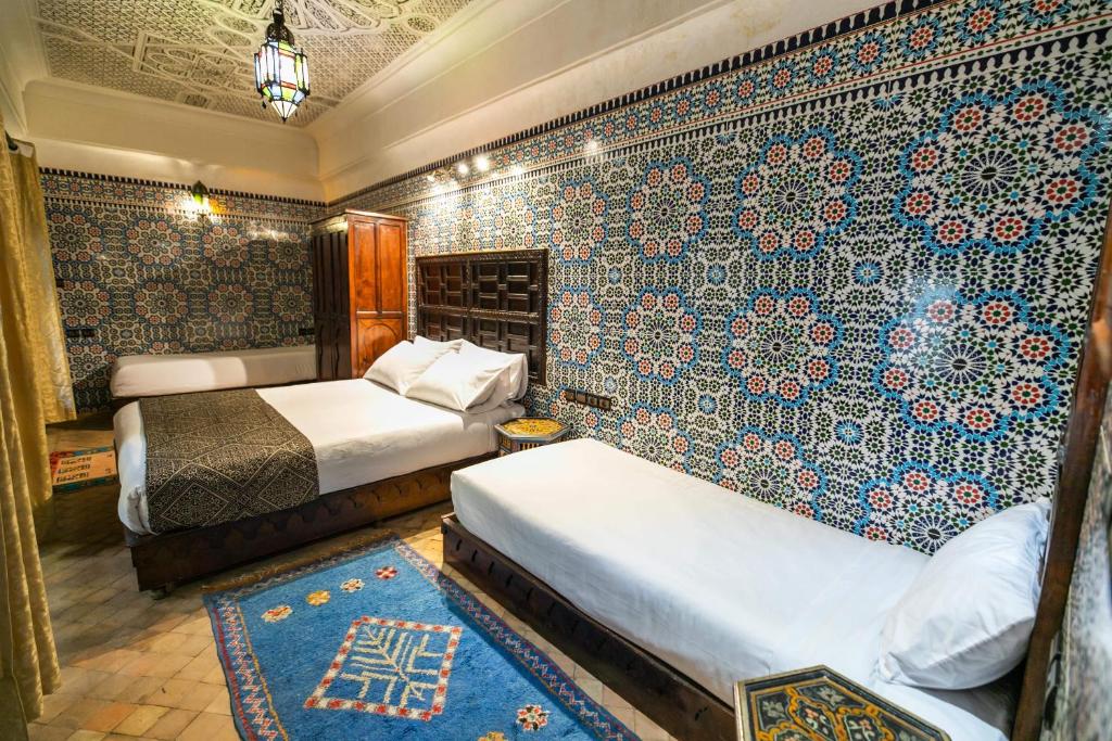 Postel nebo postele na pokoji v ubytování Riad Fes Aicha