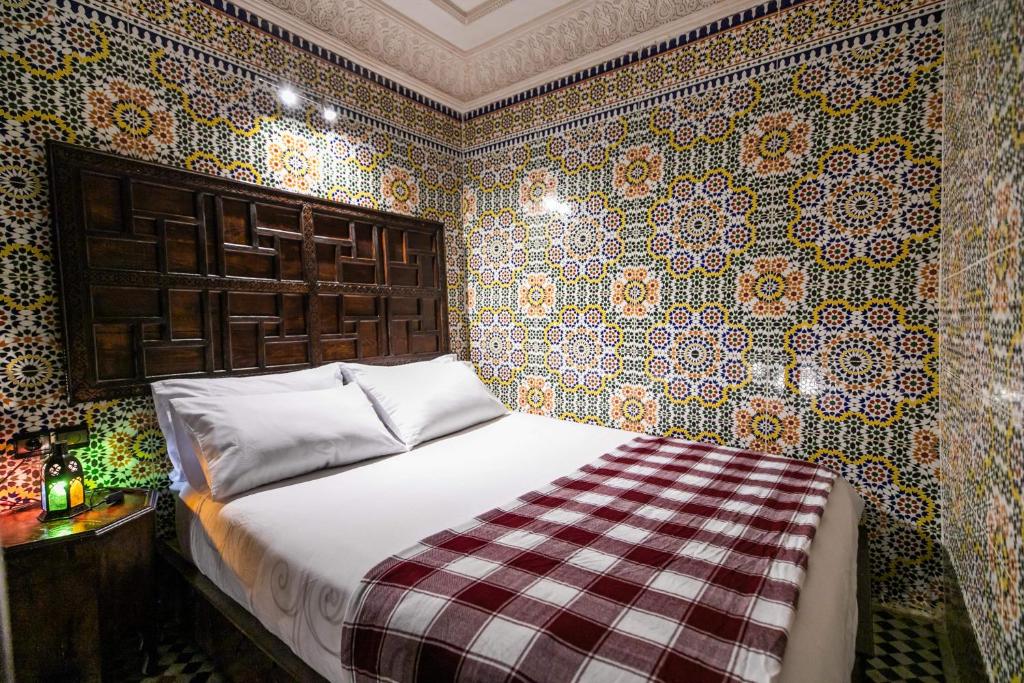 Postel nebo postele na pokoji v ubytování Riad Fes Aicha