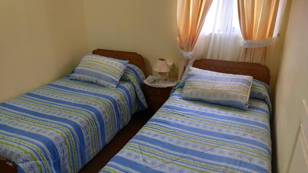 Postel nebo postele na pokoji v ubytování Hotel Iberia