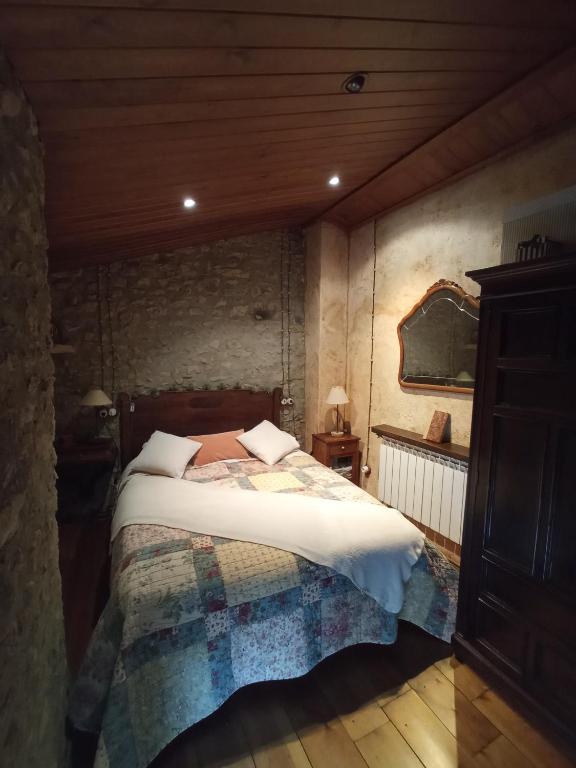 Postel nebo postele na pokoji v ubytování El Paller Urús Cerdanya