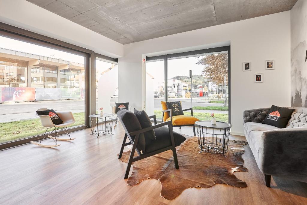 Posezení v ubytování The Cloud Suite Apartments
