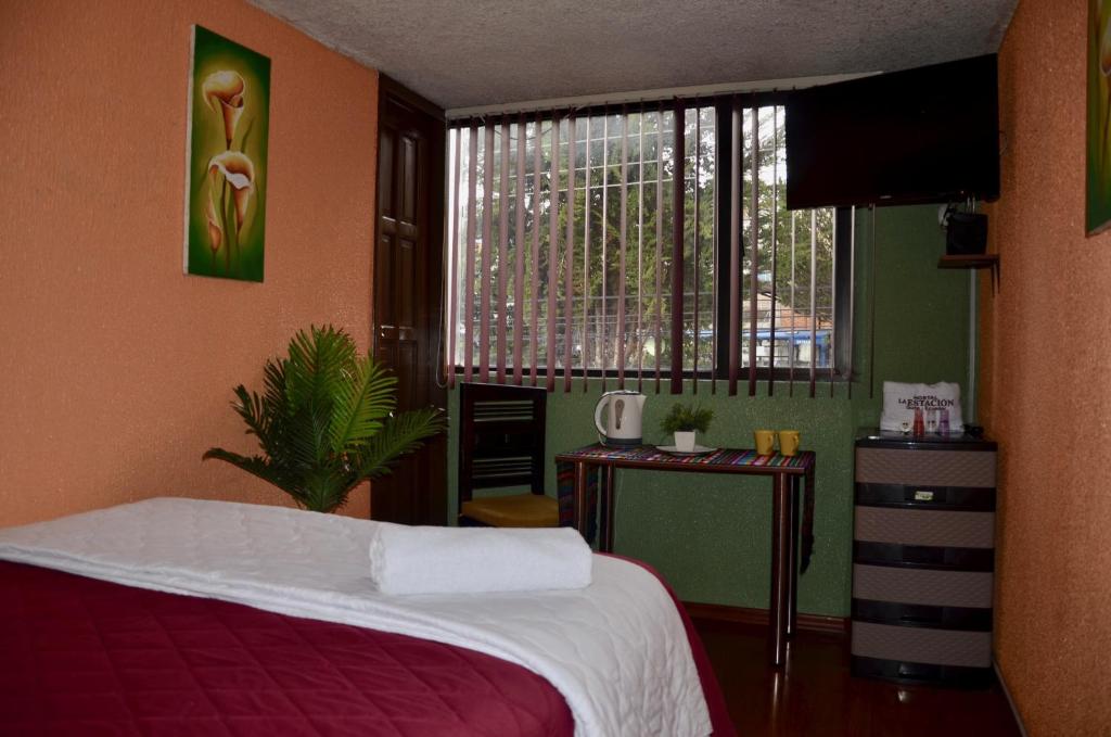 Postel nebo postele na pokoji v ubytování La Estación Hostal