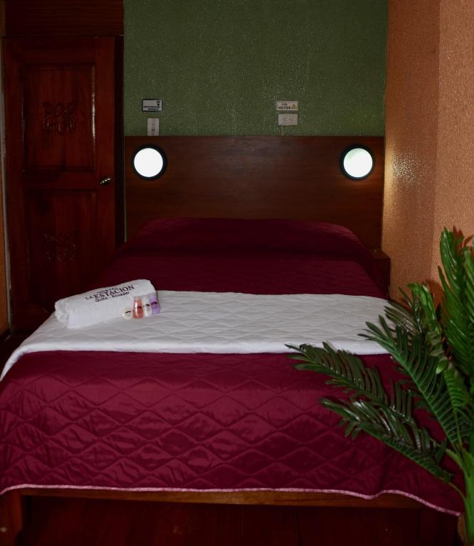 Postel nebo postele na pokoji v ubytování La Estación Hostal