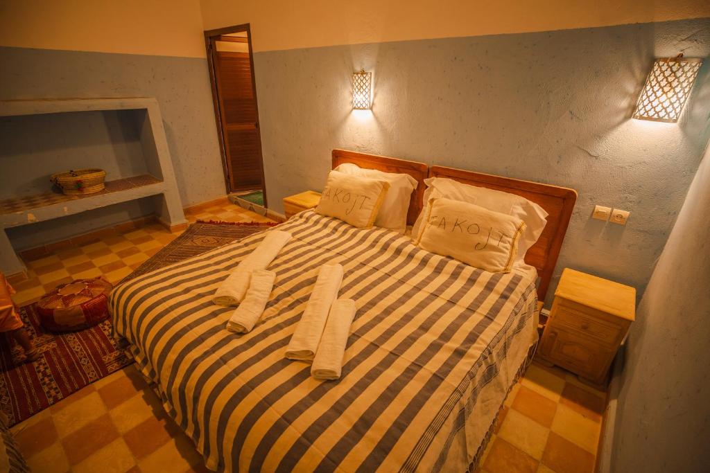 Postel nebo postele na pokoji v ubytování Takojt