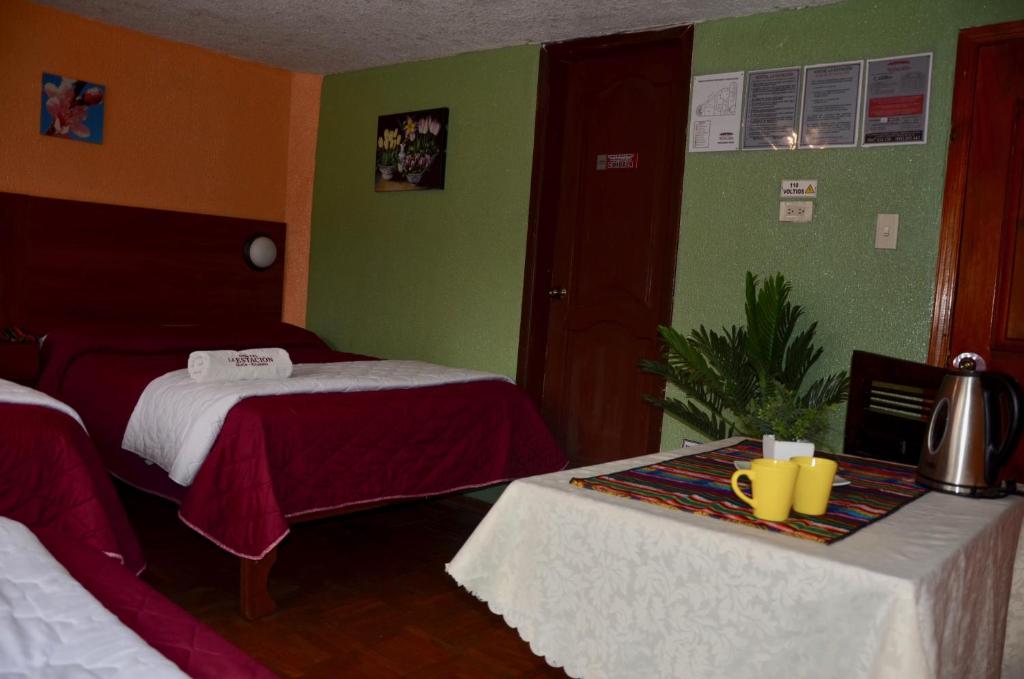Postel nebo postele na pokoji v ubytování La Estación Hostal