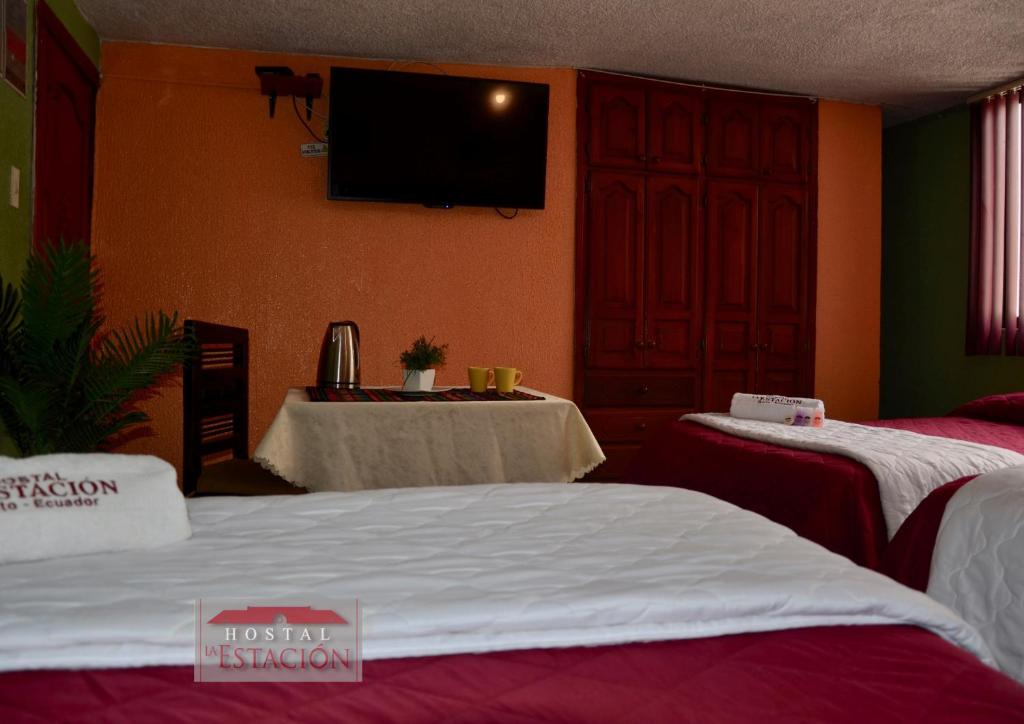 Postel nebo postele na pokoji v ubytování La Estación Hostal