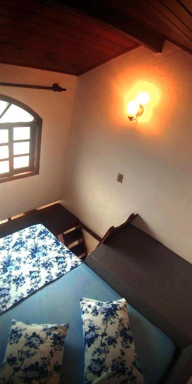 Postel nebo postele na pokoji v ubytování Pousada Em Busca do Sol