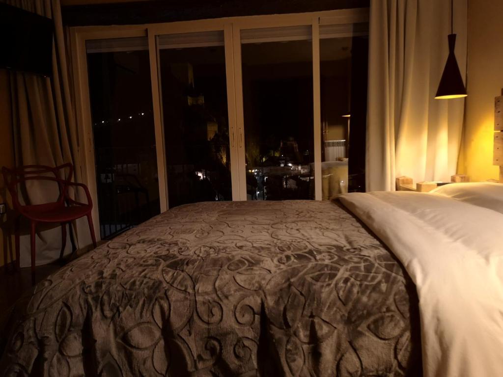Posteľ alebo postele v izbe v ubytovaní VILLAFÁBREGA