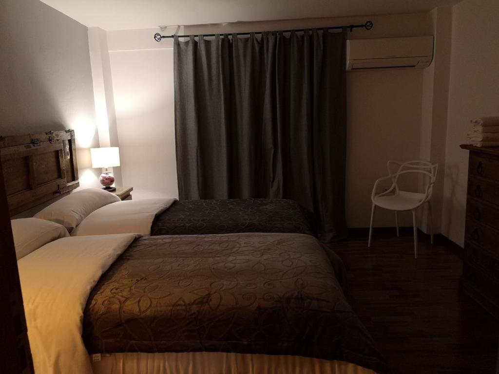 Posteľ alebo postele v izbe v ubytovaní VILLAFÁBREGA