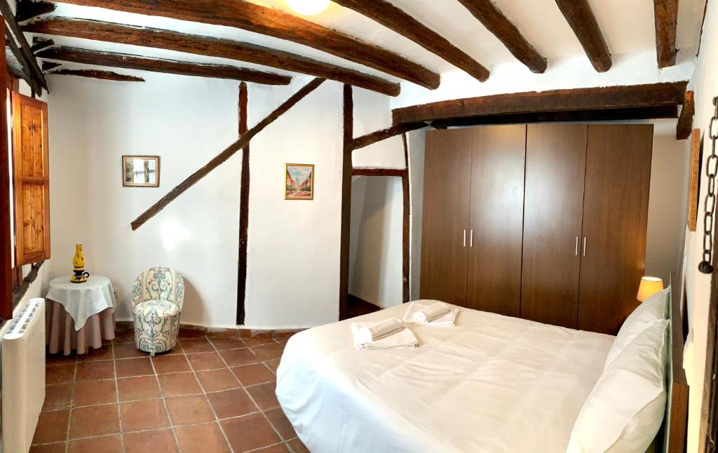 Katil atau katil-katil dalam bilik di Casa La Corrala